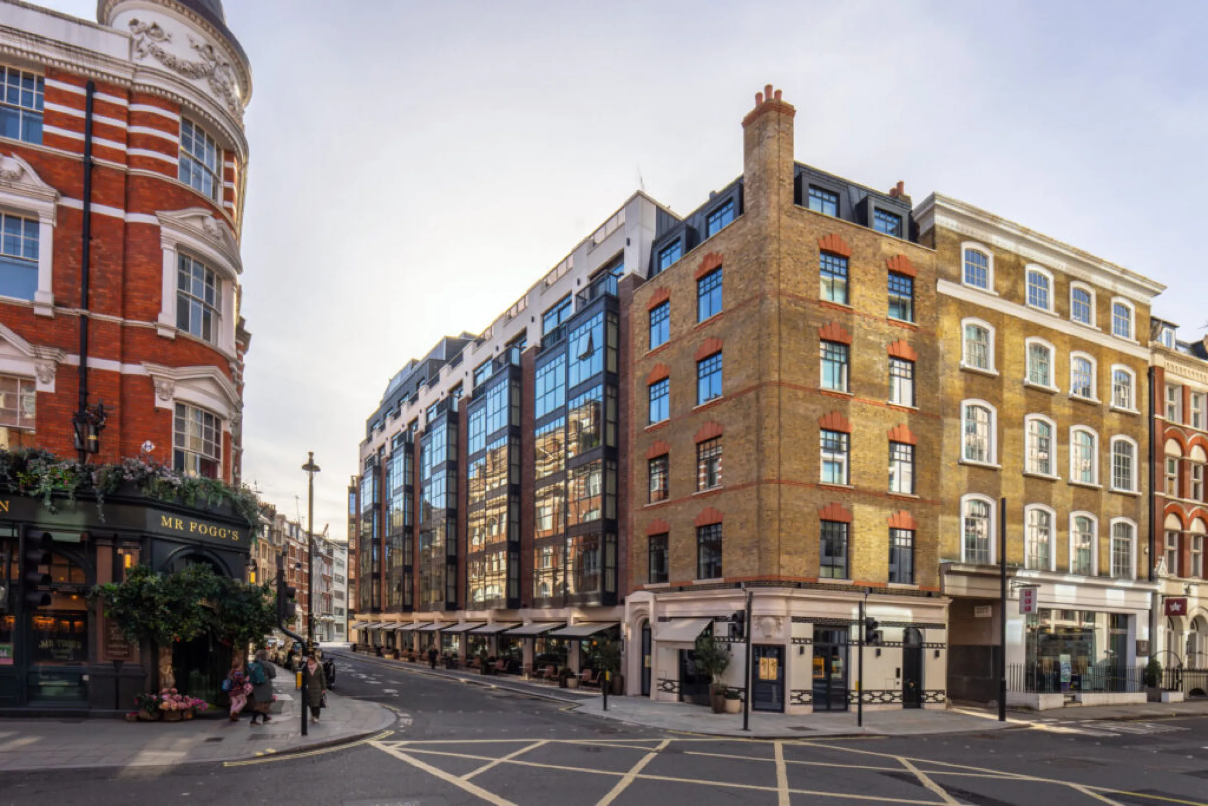 The Newman Hotel, Fitzrovia — a luxury boutique hotel interior with rich wood tones and Art Deco detailing